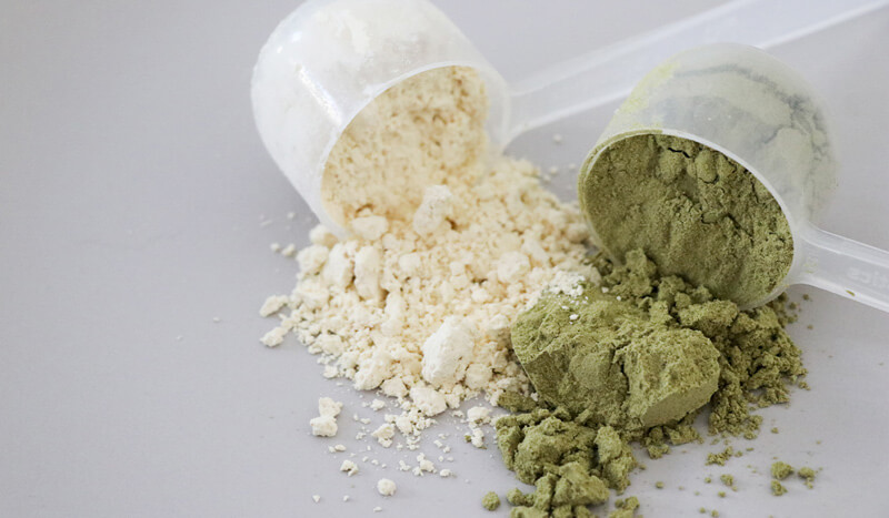 White-and-green-supplement-powders-for-alternative-health