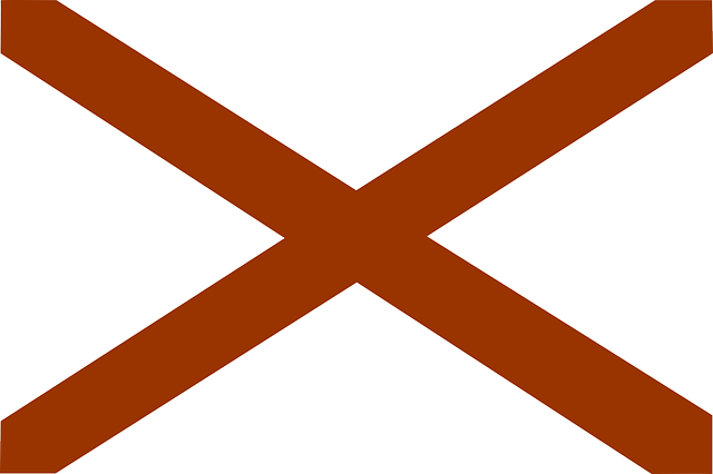 The flag of Alabama; a red X over a white background
