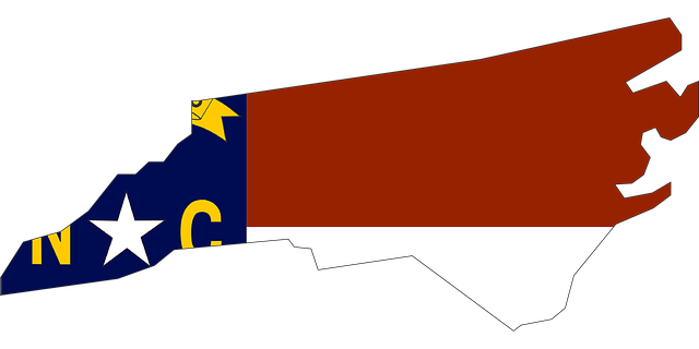 North Carolina flag cropped in the shape of North Carolina