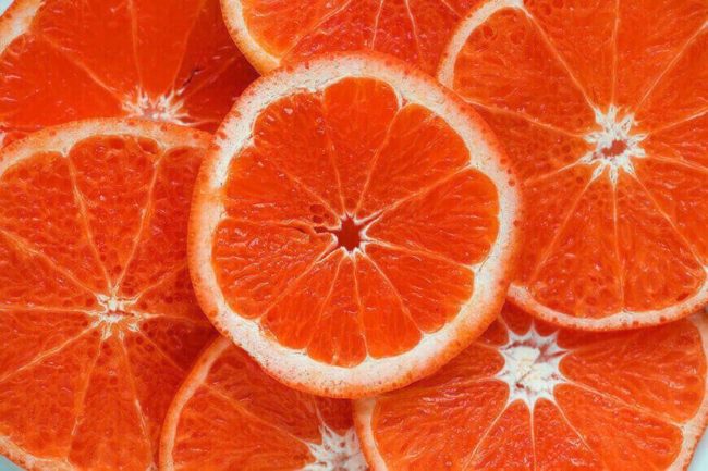 A close-up of slices of grapefruit