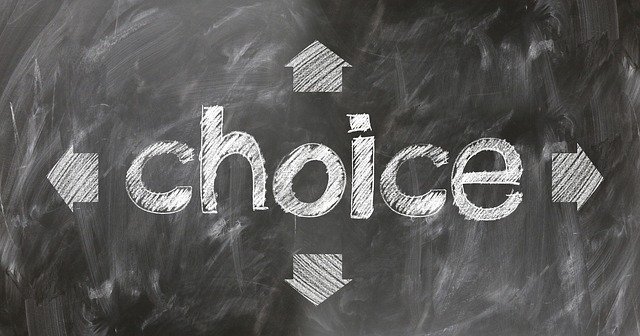 the word “choice” written on a chalkboard with arrows pointing in every direction