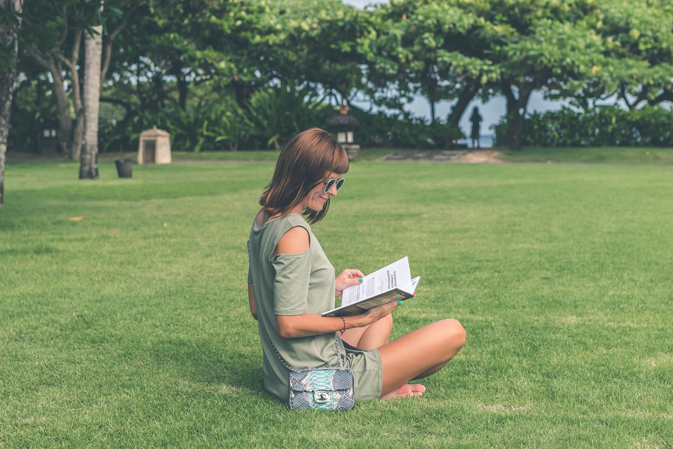 Woman reading in a park